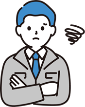 腕を組んで困った表情をしている作業着の男性
